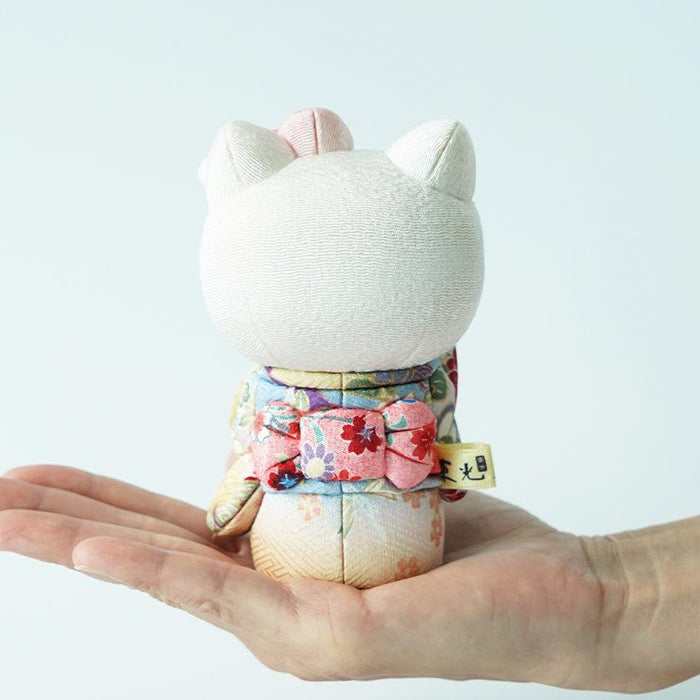 Handcrafted maneki neko lucky cat Hello Kitty fabric doll in floral kimono, held in palm | Edo art dolls, Kakinuma Dolls