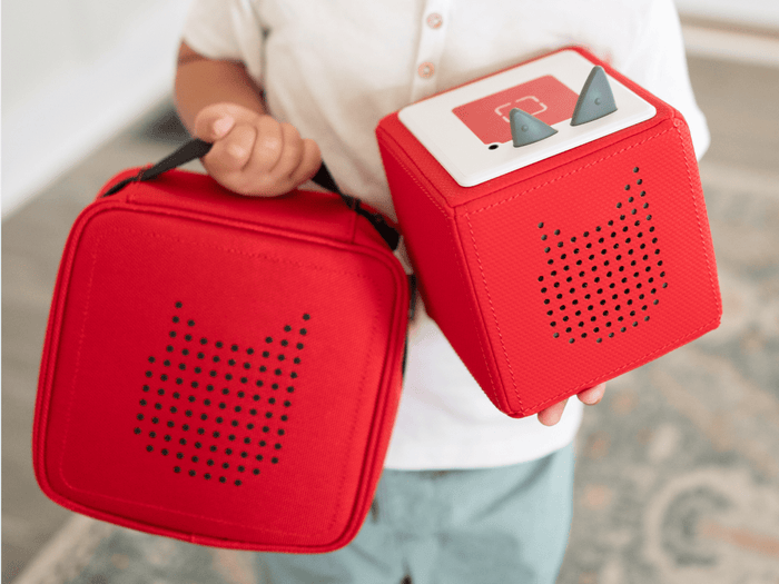 Child Holding Tonies Carrying Case