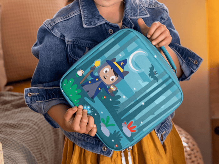 Child playing with Toniebox, Tonies, and Carrying Case Max for Tonies - Enchanted Forest