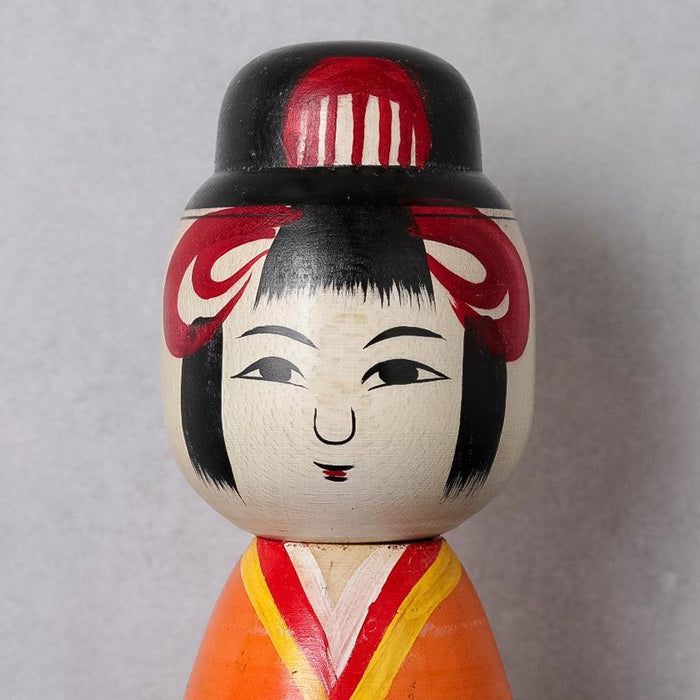 Taisho-style kokeshi wooden doll with hand-painted face, orange kimono | Tsuchiyu, Fukushima, Konno Akihiro