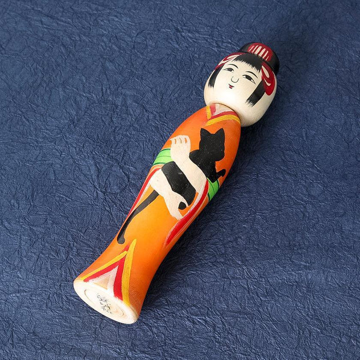 Taisho-style kokeshi wooden doll in orange kimono with cat motif | Tsuchiyu, Fukushima, Konno Akihiro