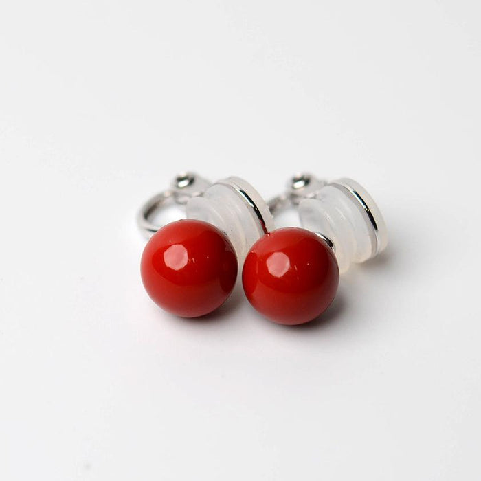 Clip-on earrings for both ears.