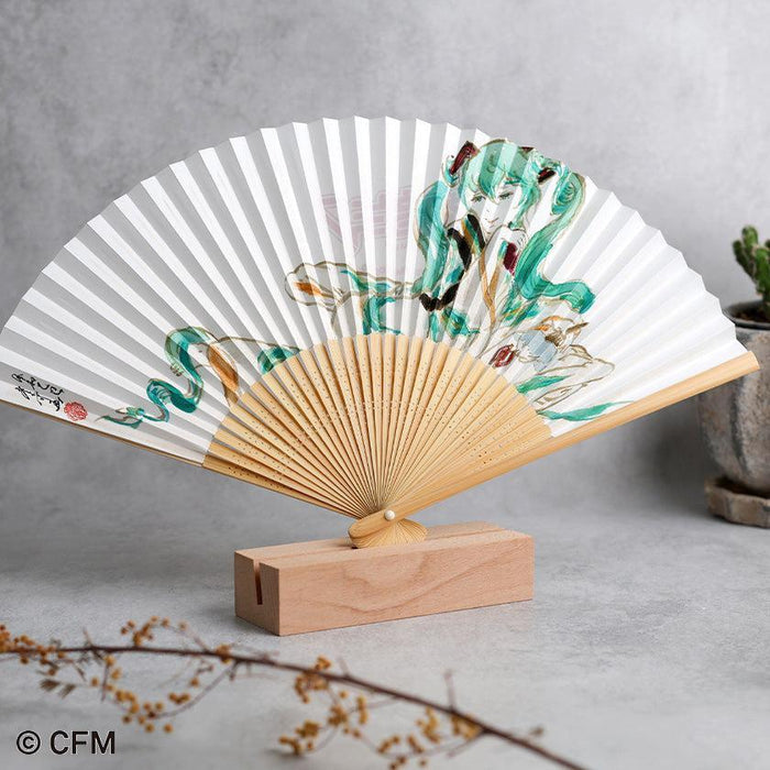 Hatsune Miku folding fan with bamboo ribs on wooden stand | Kyoto folding fan, Hatsune Koubou