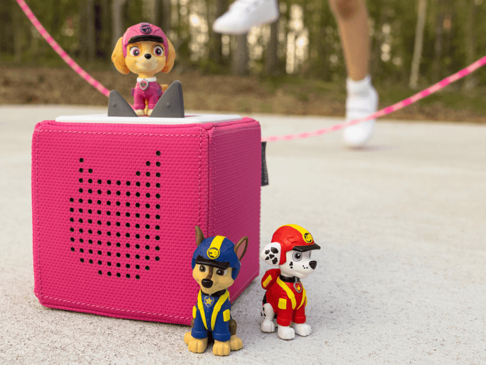 Child Playing With Jungle Pups Skye Tonie  Audio Figurine And Toniebox 2