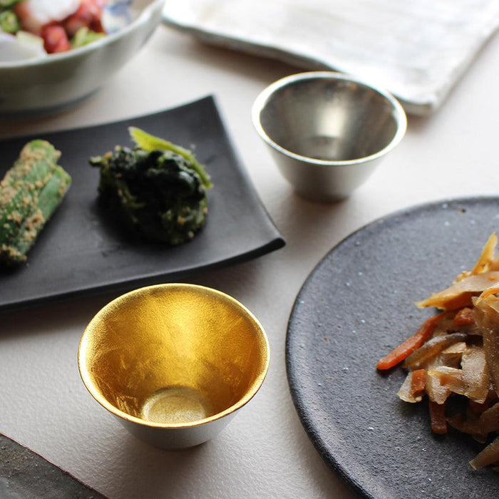 Gold leaf and tin sake cup set styled with Japanese small dishes | Nousaku, Takaoka