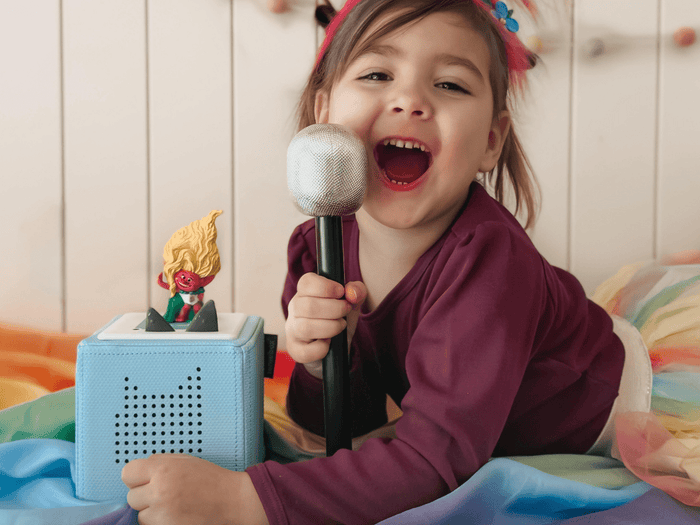 Child Playing With Trolls: Viva Tonie