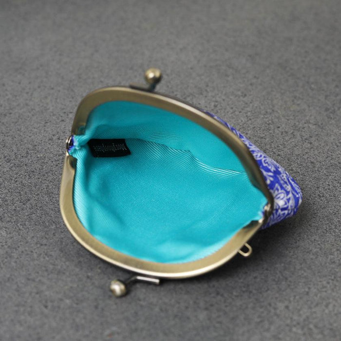 Open silk coin purse with gold clasp frame and turquoise lining, Kyoto Yuzen dyeing | Morphosphere